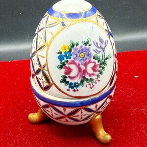 Hand-painted porcelain egg trinket box, footed